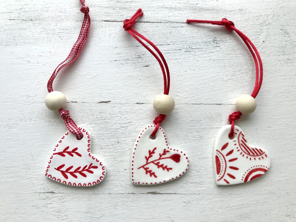 Three Red and White corn flour christmas decorations